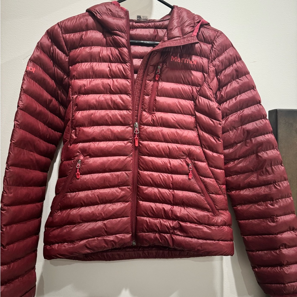 Marmot coat. Size small. Color is maroon